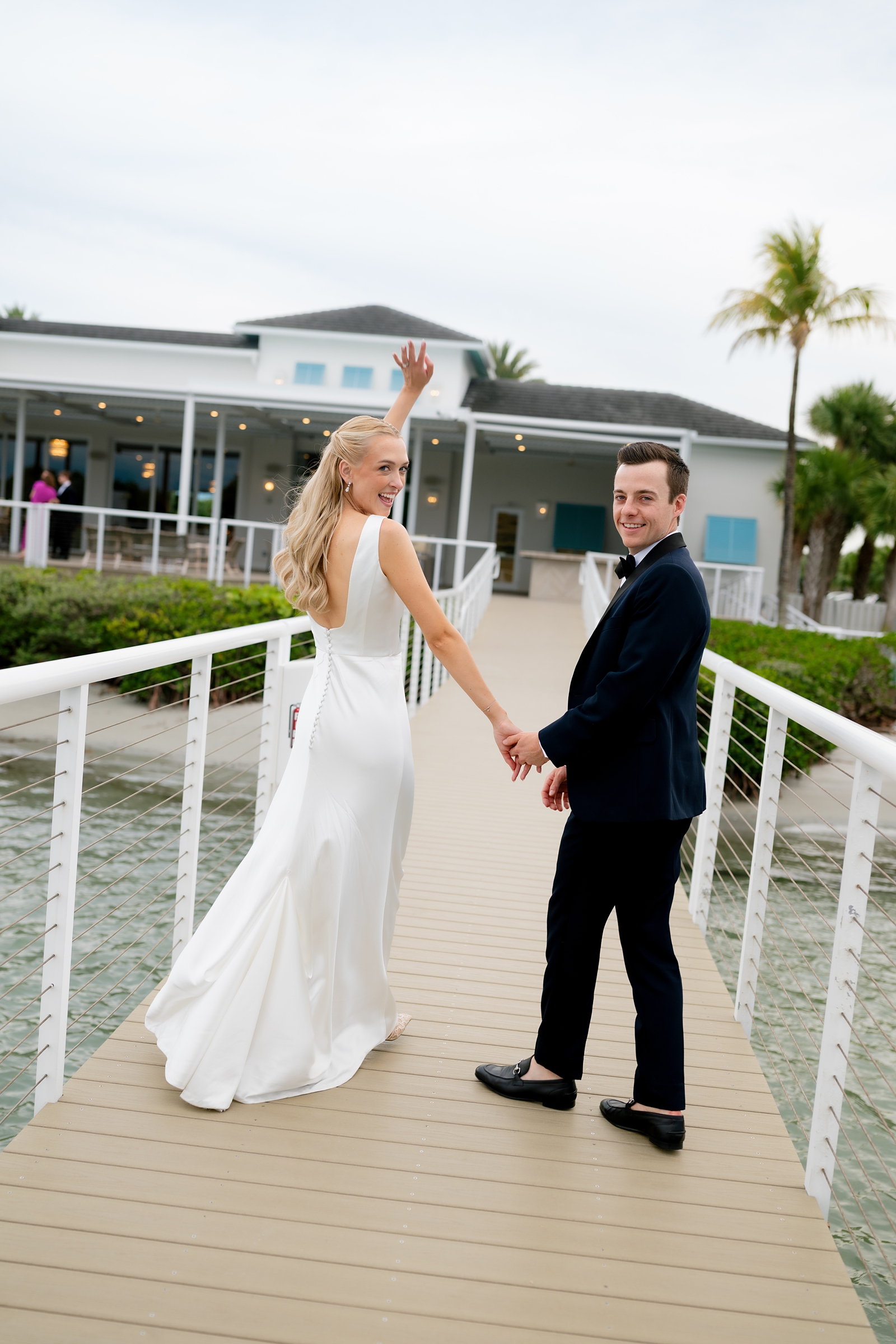 A spring wedding at the Pelican Club Jupiter captured by Sunny Lee Photography. Tropical florals, citrus details, and a joyful black-tie Jupiter celebration.